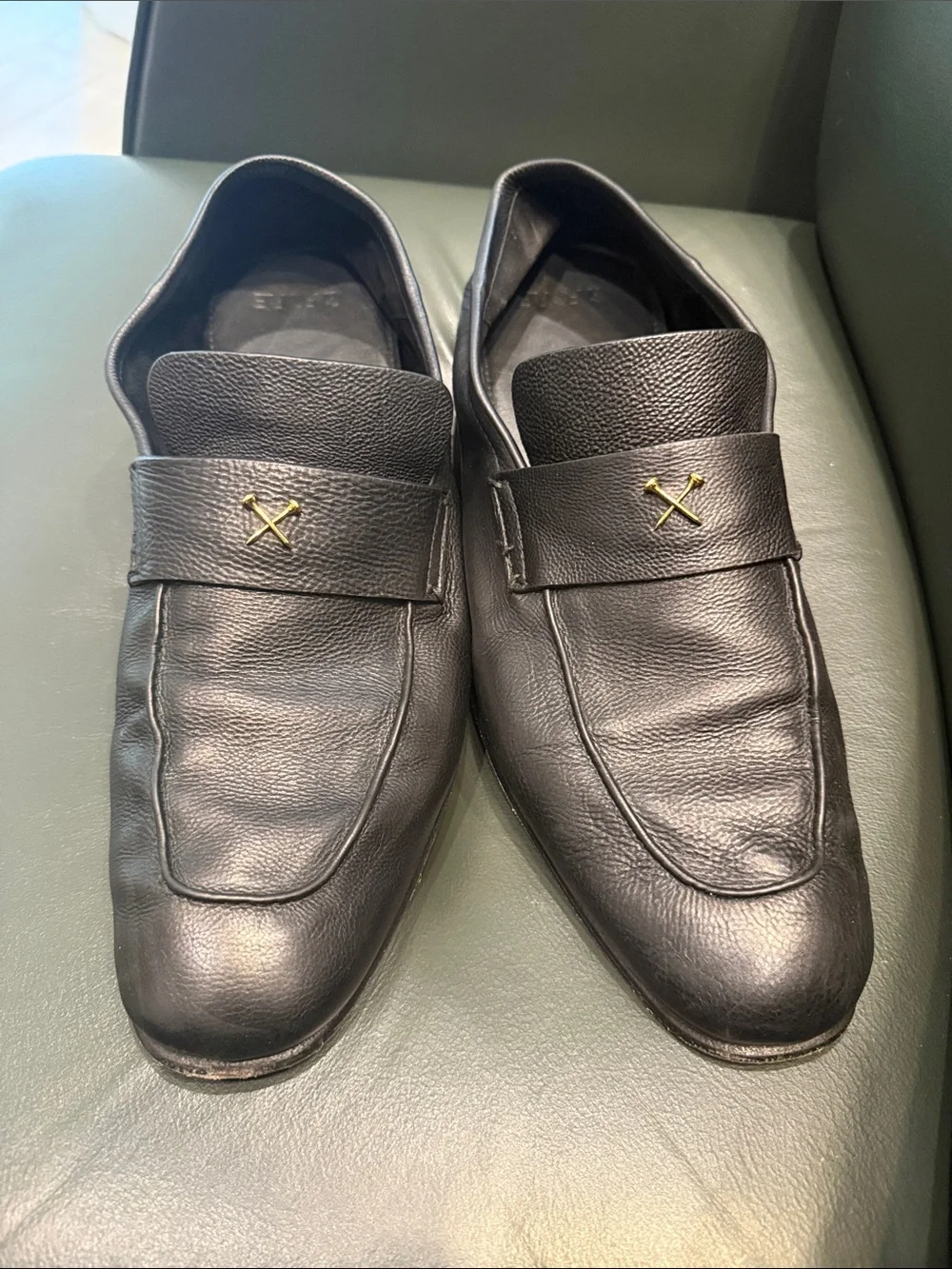 G/FORE Black Leather Slip-On Loafers with Gold Cross Accent